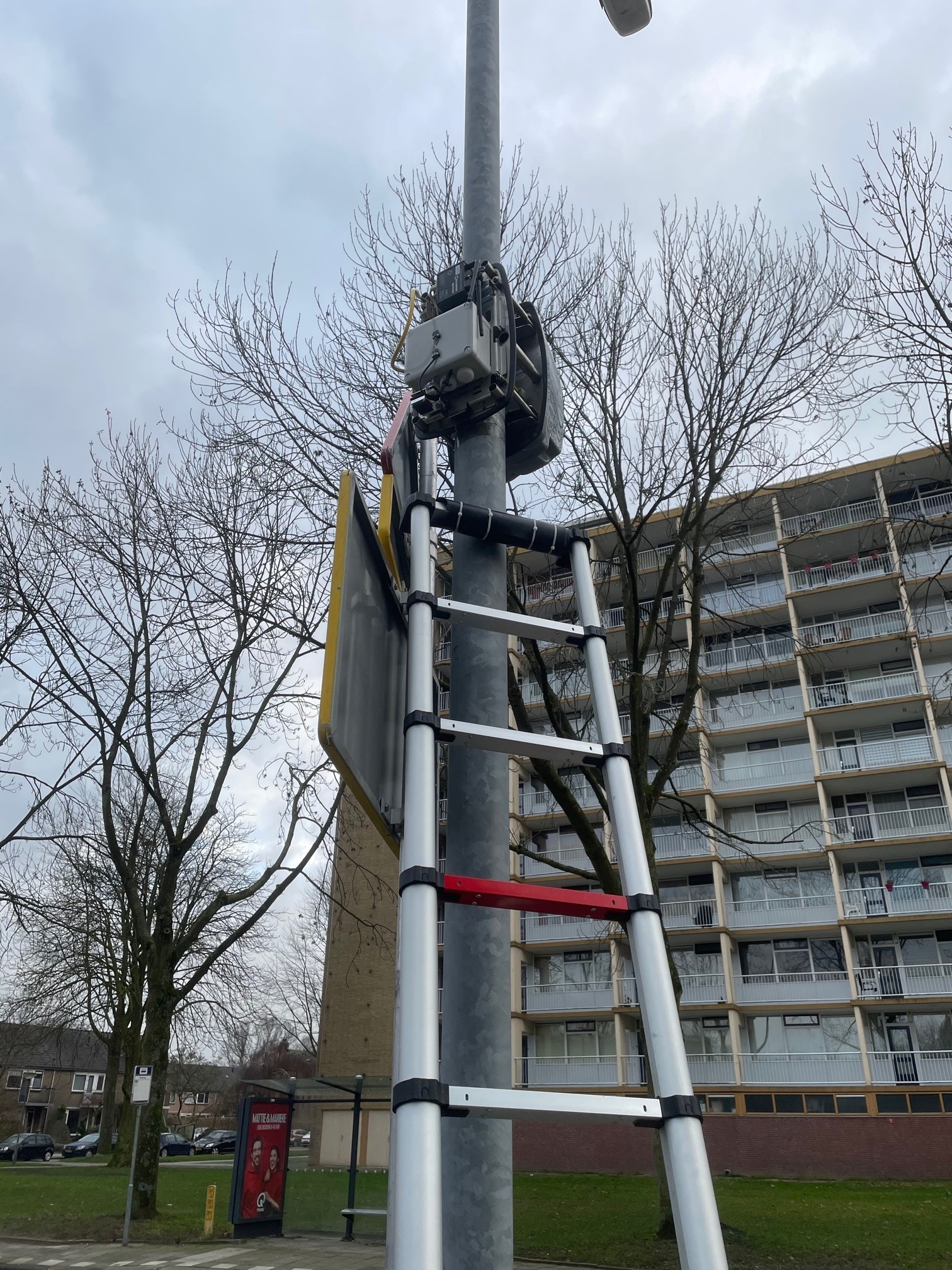 fotos AMS met ladder